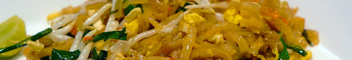 Eating Chicken Wing Thai at Wendill's Chicken House restaurant in Pacoima, CA.